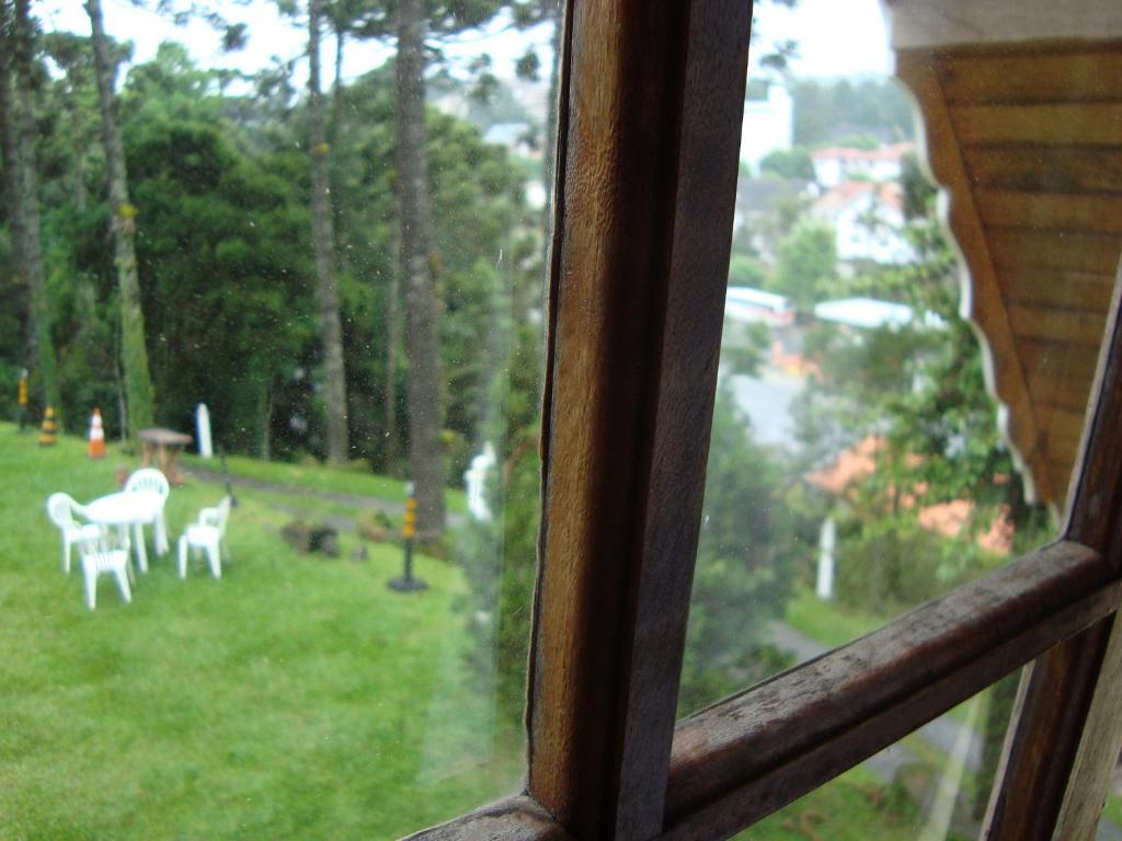Suiço De *